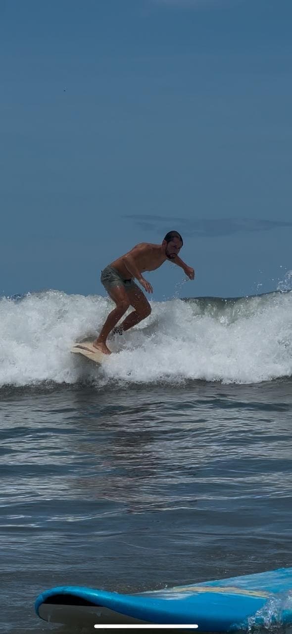 Surfer riding a wave in Panama