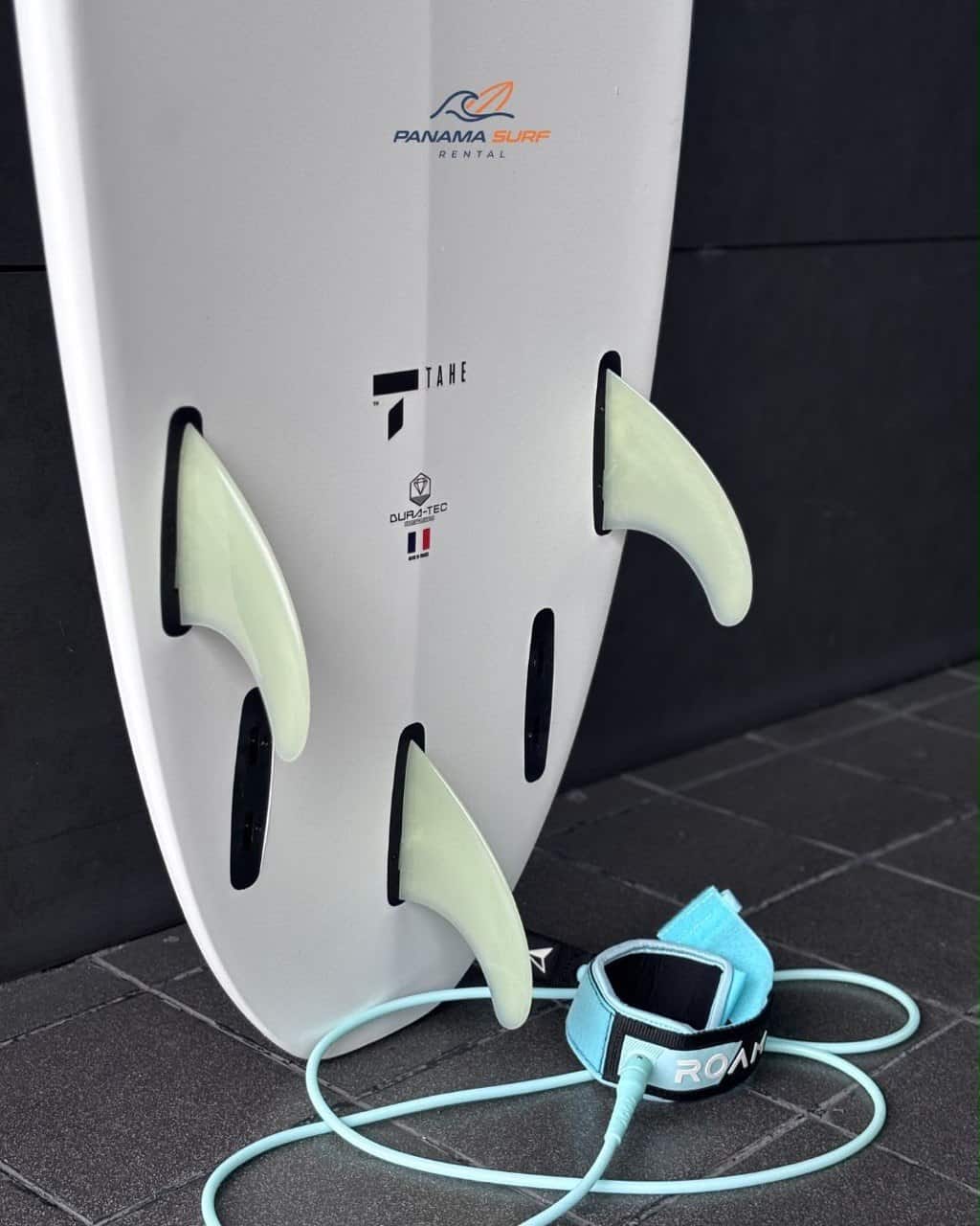Surfboard fins and leash included with rental